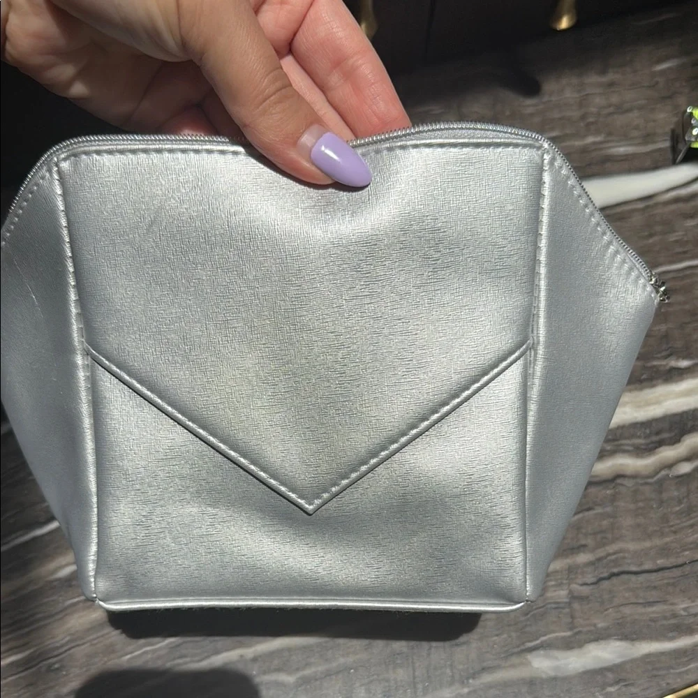 La Prairie Silver Cosmetic Bag with Geometric Design